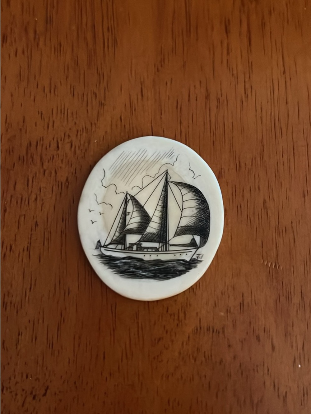 Scrimshaw genuine bone token